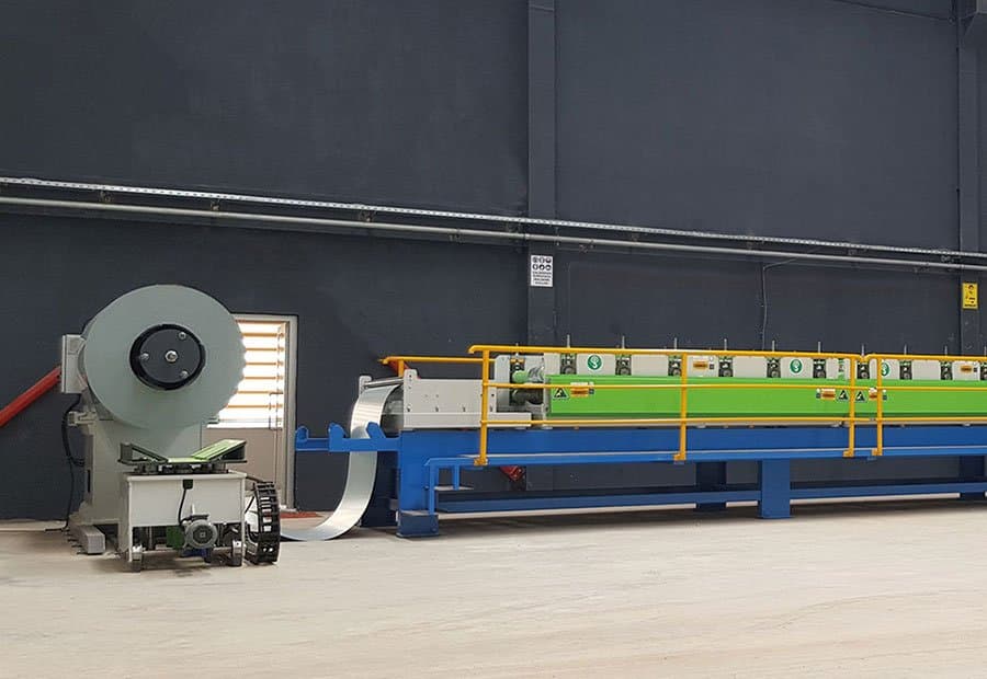 Machine voor de productie van bouwmaterialen